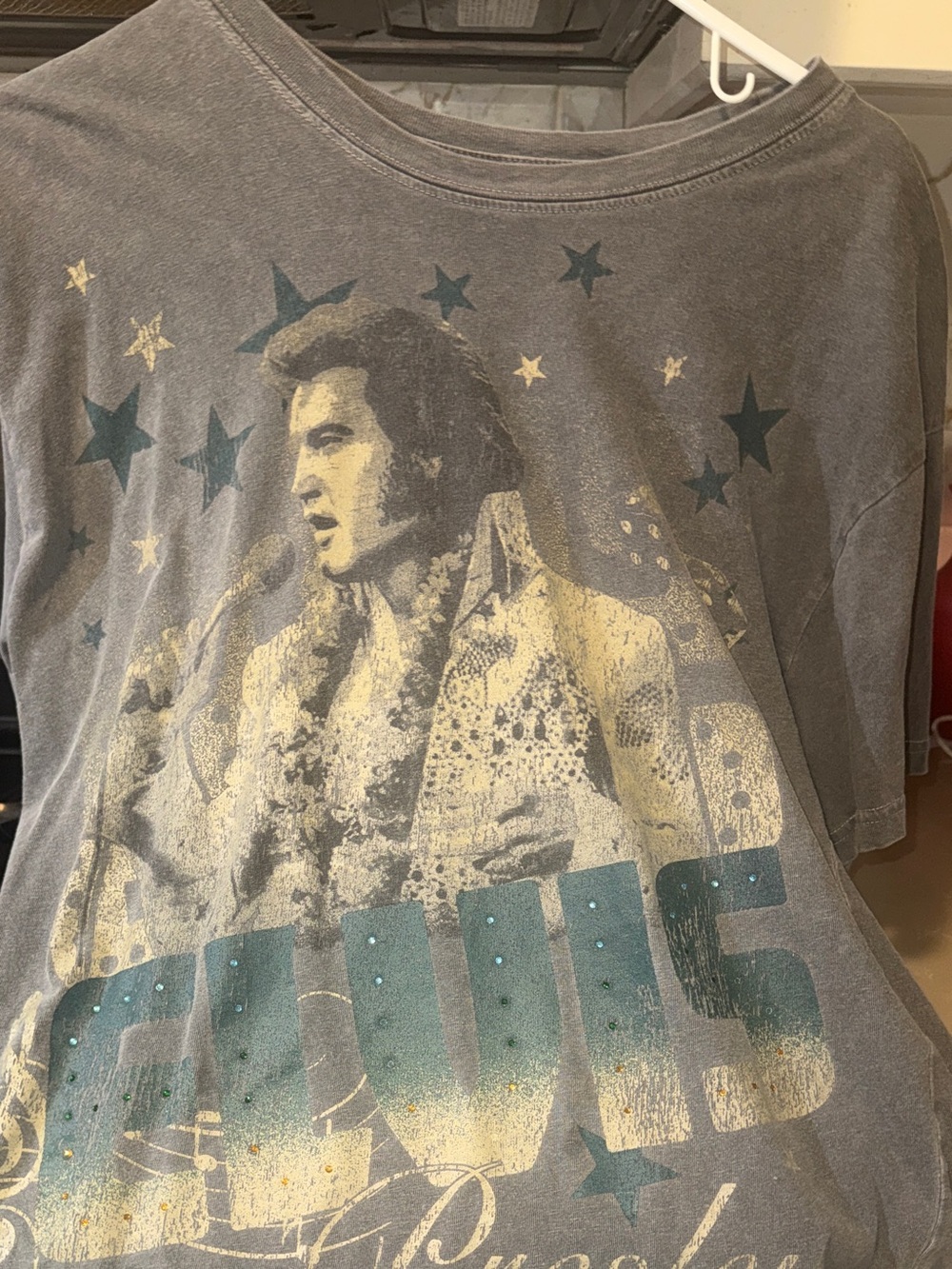 Vintage-Style Graphic Tee with Cream Portrait and Teal Stars